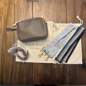 Pom Pom London City Bag in Taupe. 100% leather. 3 straps, Tassel Keyring.
